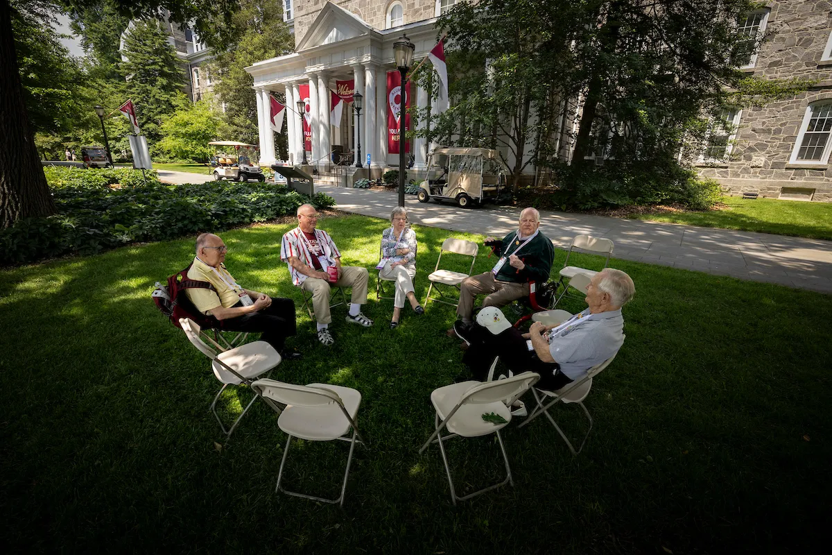 Alumni sitting in circle of chairs
