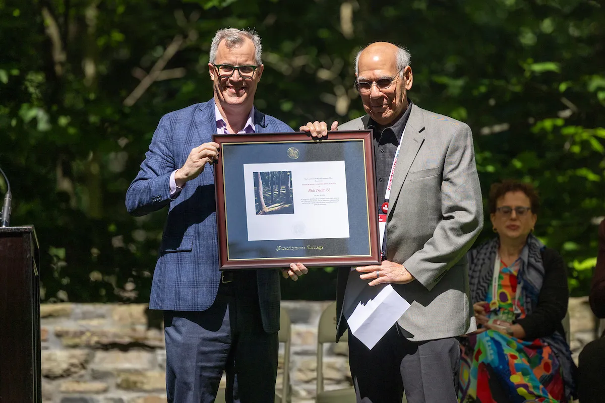 Rich Truitt receives award from Jim Sailer