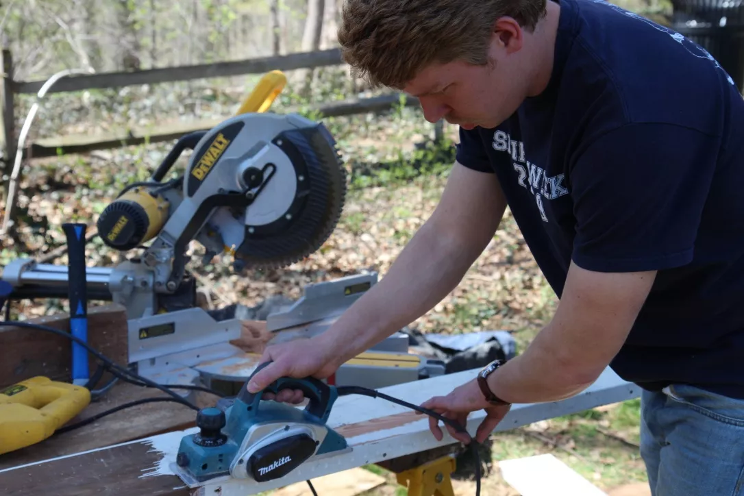 Construction of Jonathon Molloy '14 working on the construction of Oxbow.