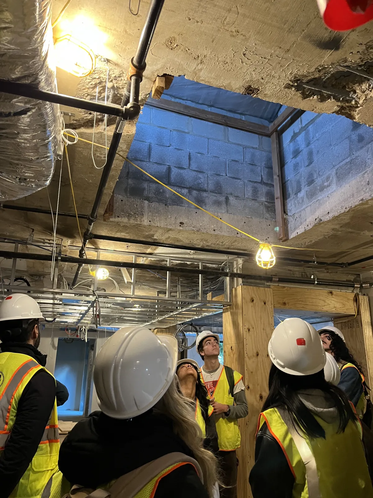 Architectures of Air class tour through the Sharples construction site.