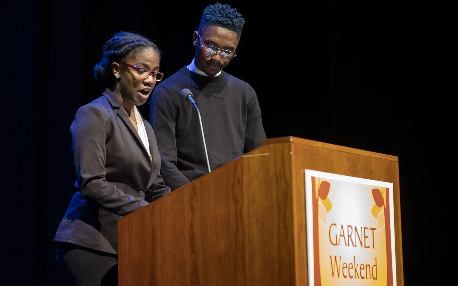 Shelby Billups '20 and Tyler White '22 at podium