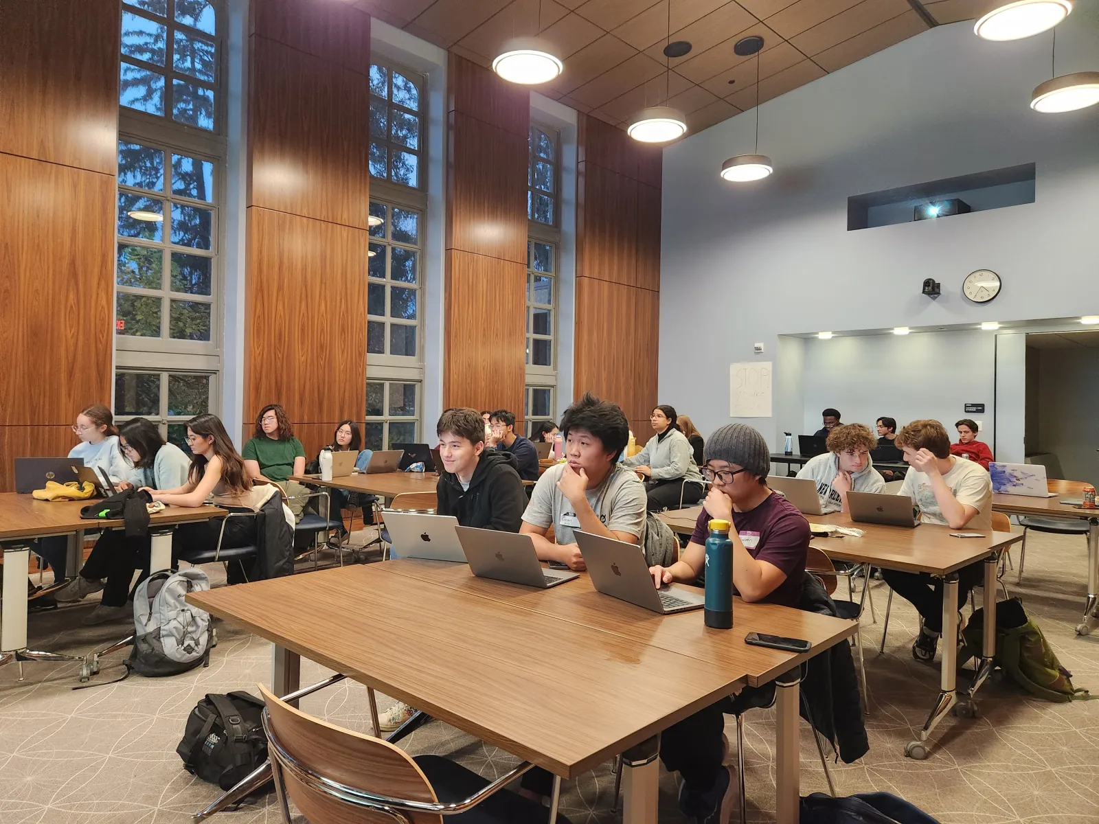Students listening to pitches