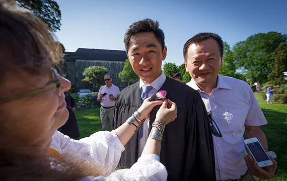 The tradition of graduating seniors receiving roses from the Dean Bond Rose Garden prior to Commencement continues.