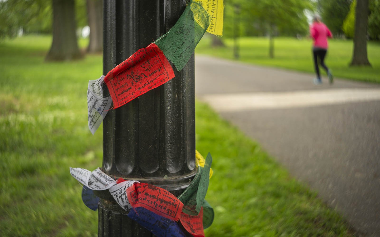 Prayer flags wrapped around lamp post in honor of Sam Jenkins '19