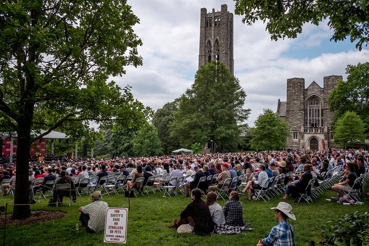 People sitting in rows of chairs