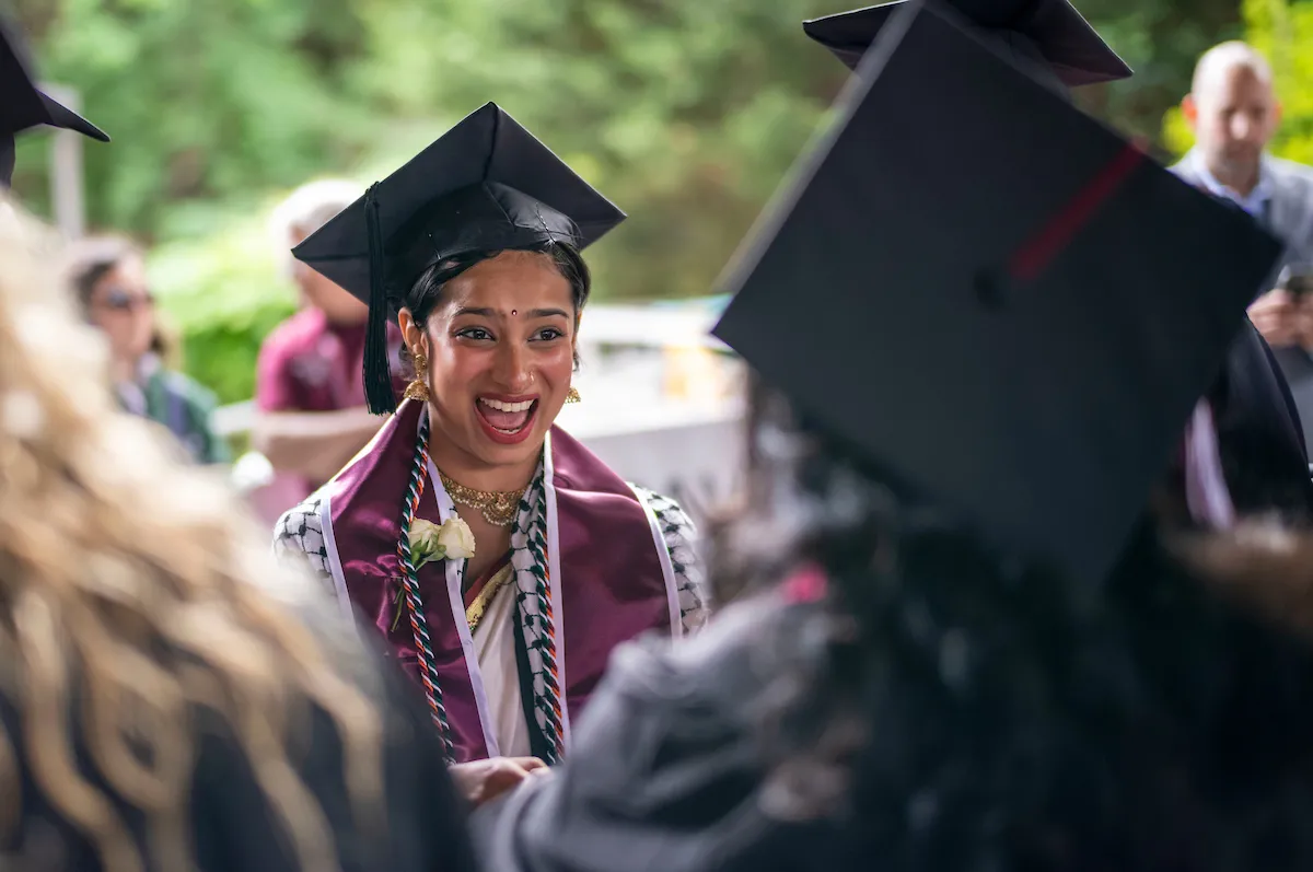 Student celebrates after commencement