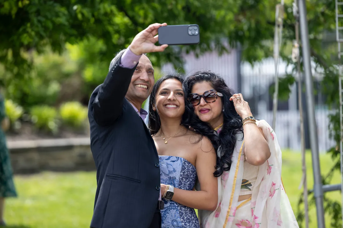 Family takes selfie after commencement