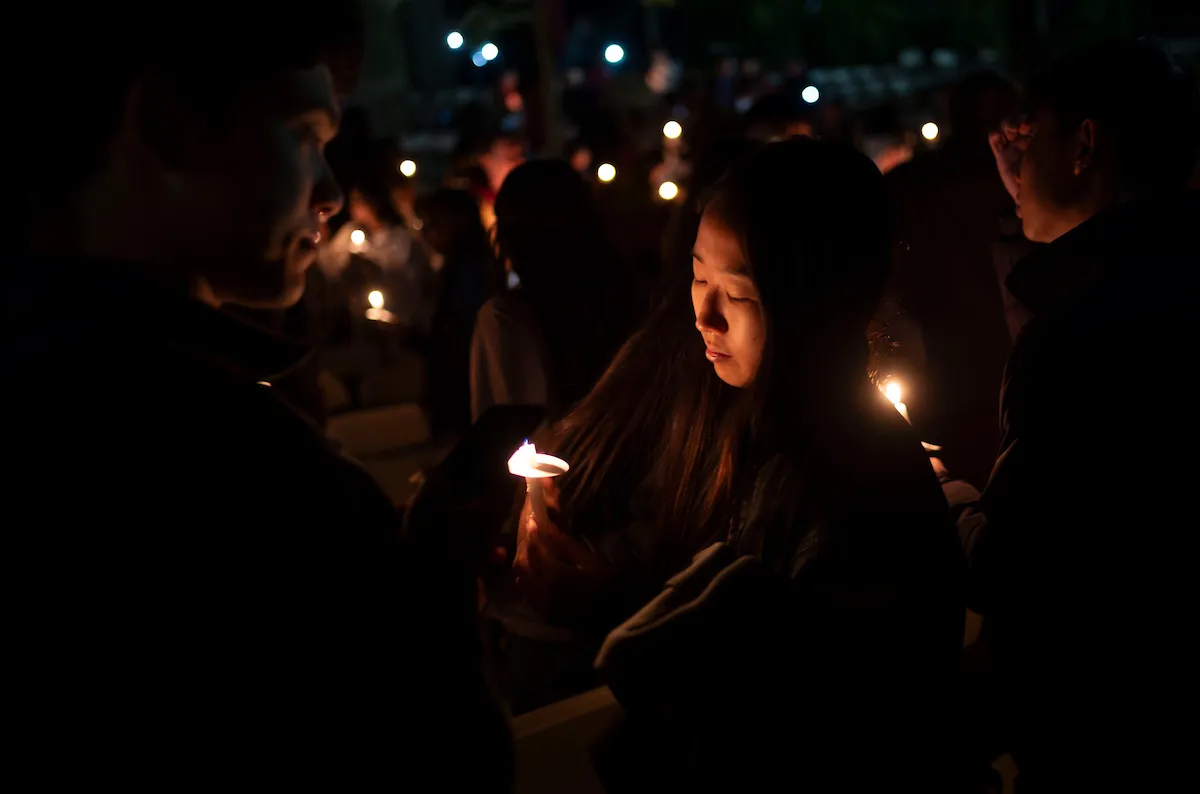 Students with candles at Last Collection
