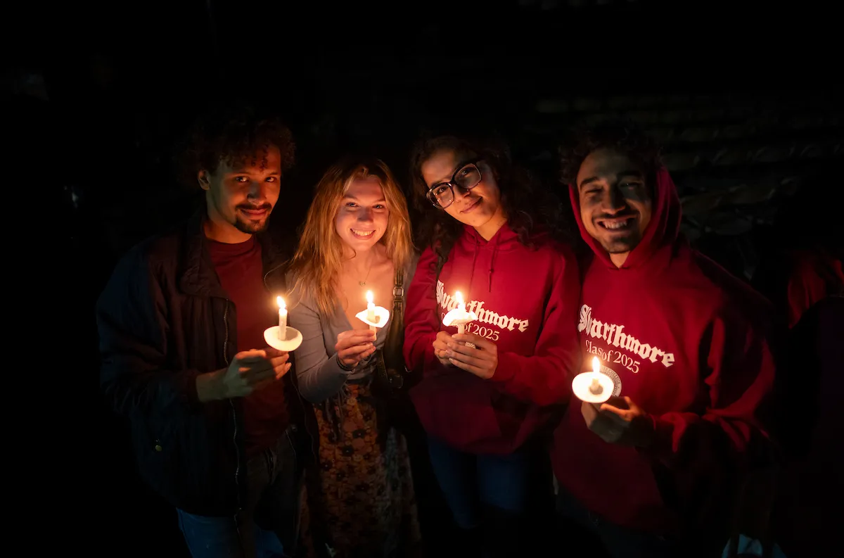 Students with candles at Last Collection