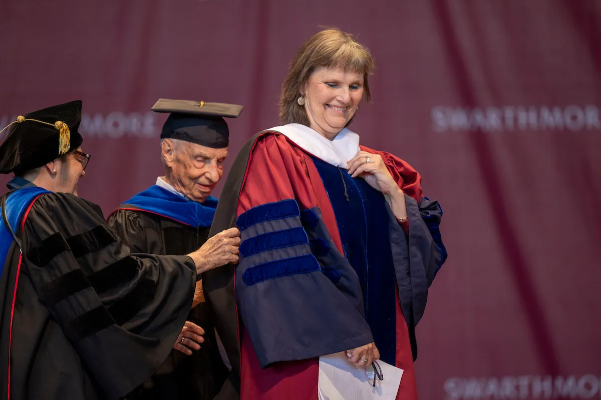 Kim Cassidy receives hood at commencement