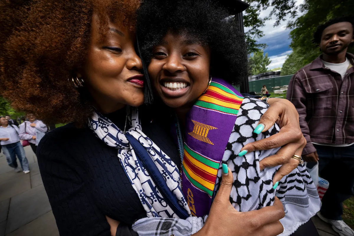 Students hug before baccalaureate