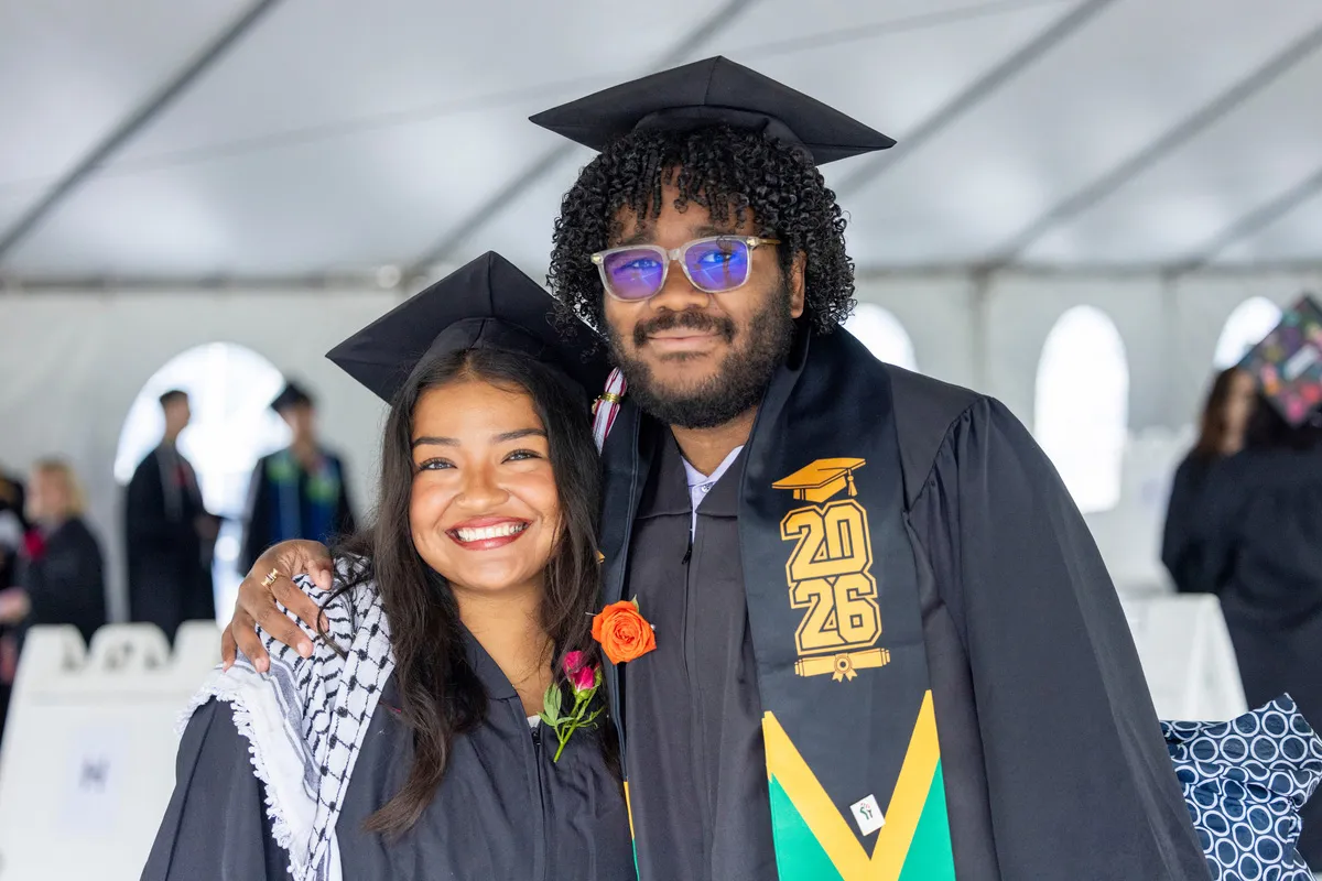 Students pose at commencement