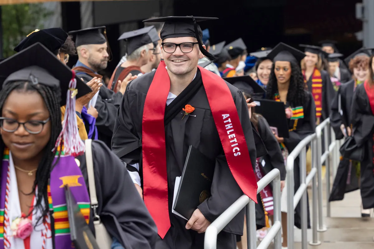 Students exit commencement ceremony