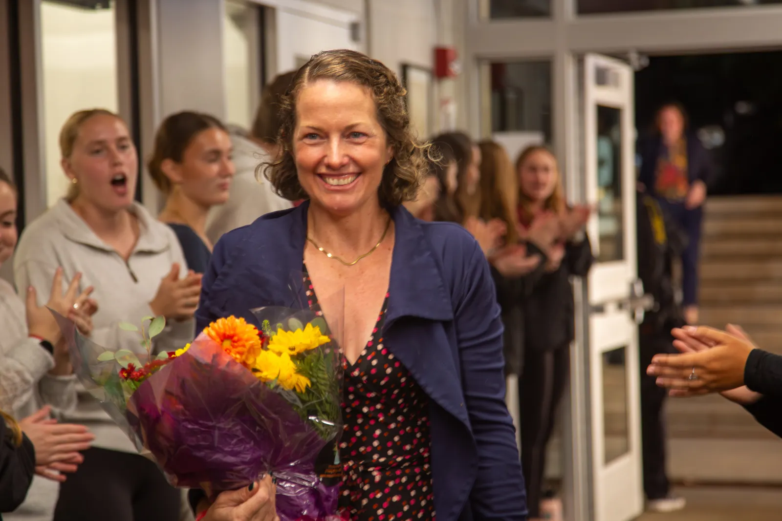 Sonya Reynolds with bouquet of flowers