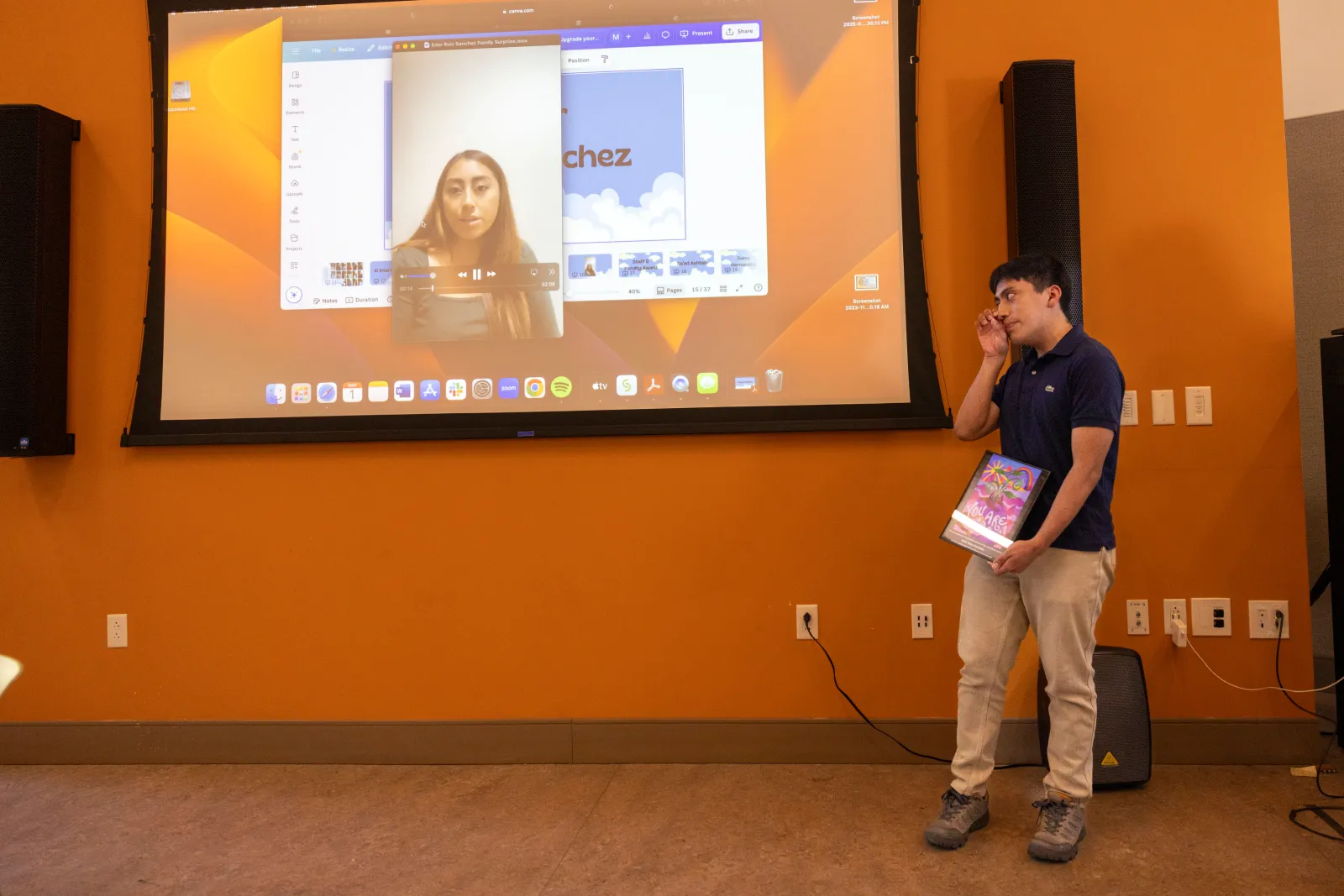 Student Awardee Watching a Special Video from His Family