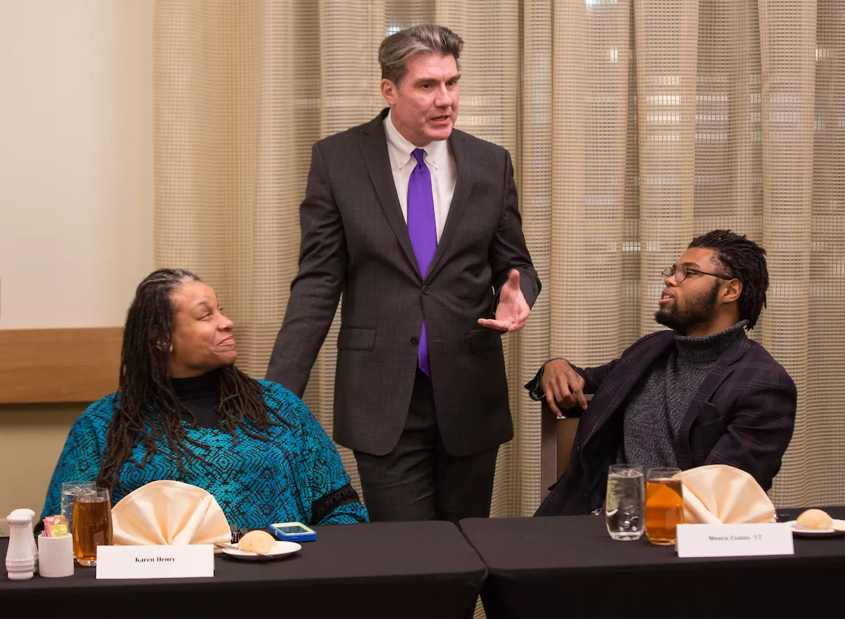 Student at Mellon Mays dinner with Mark Wallace and Karen Henry