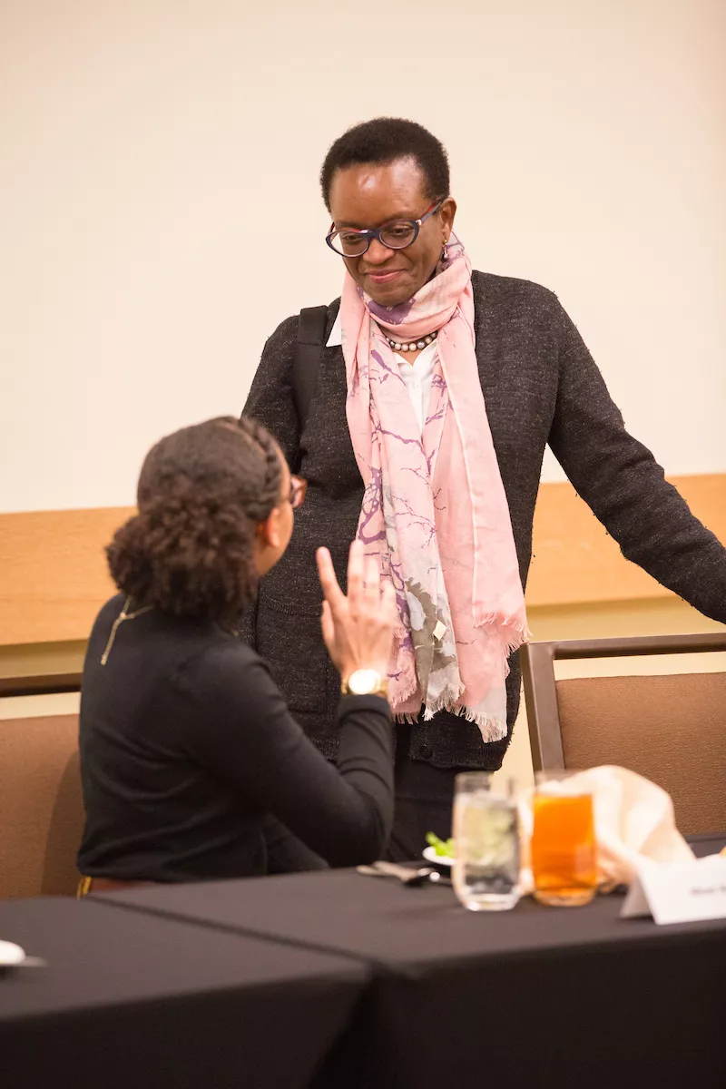 President smith speaks with student
