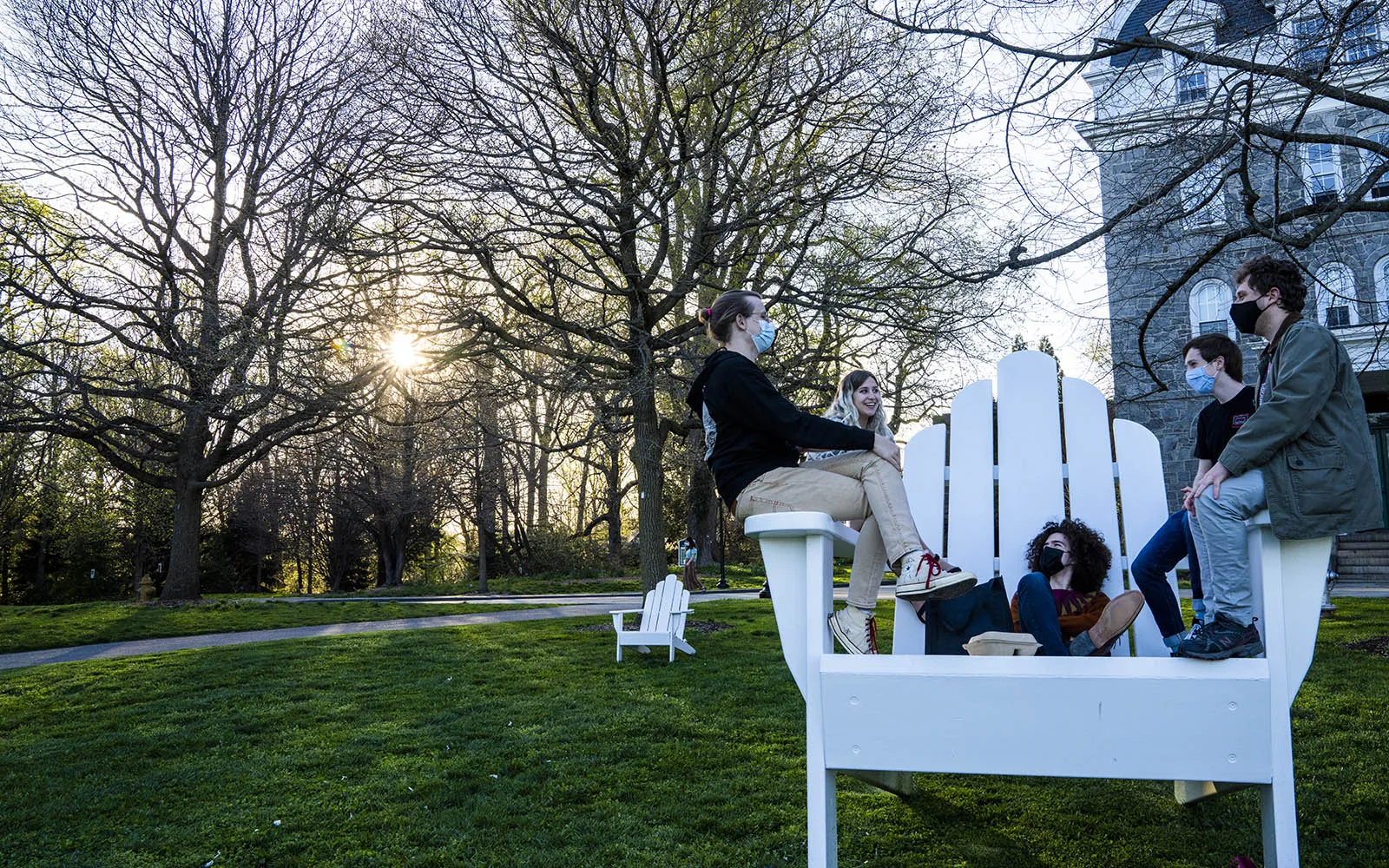 students in big chair