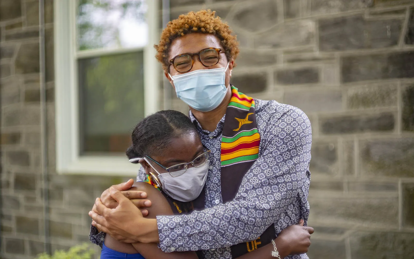two students hugging