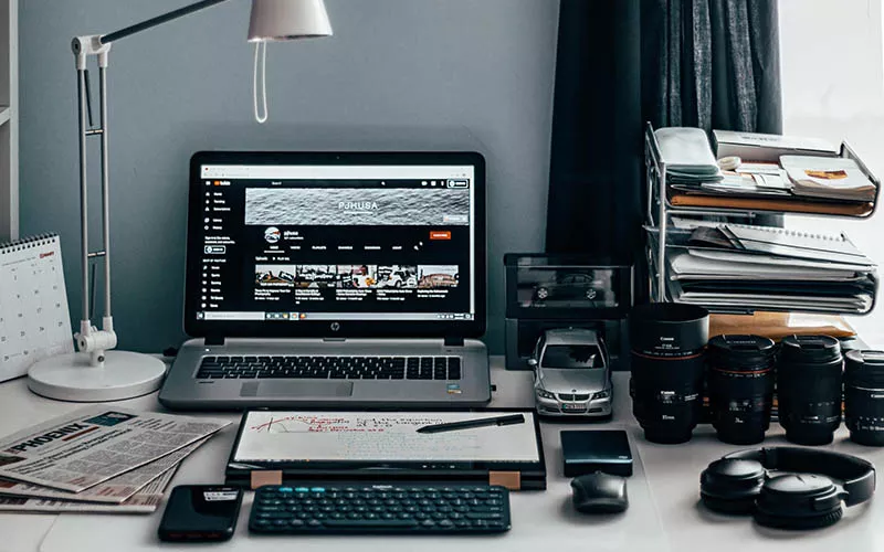 laptop and camera lenses