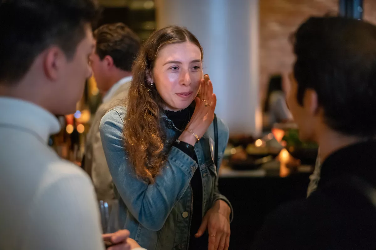 Young alumni mingle at an event in New York City