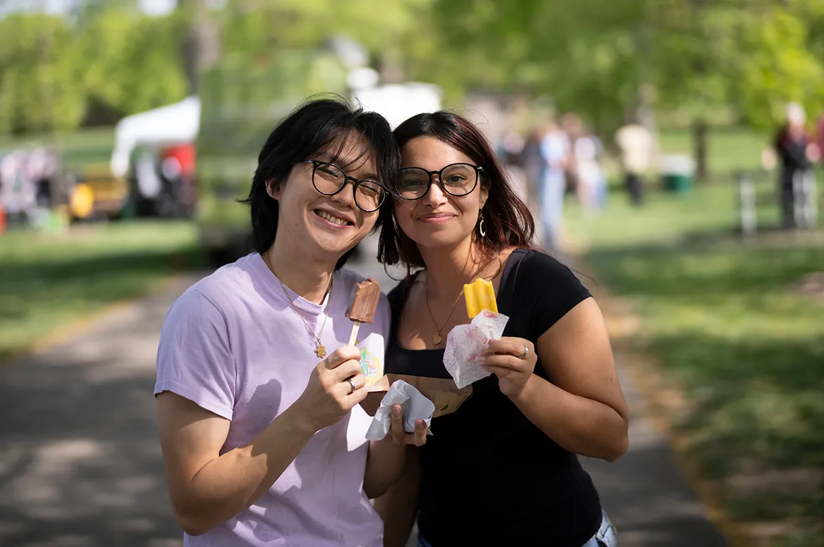 Students eat popsicles during Garnet day event