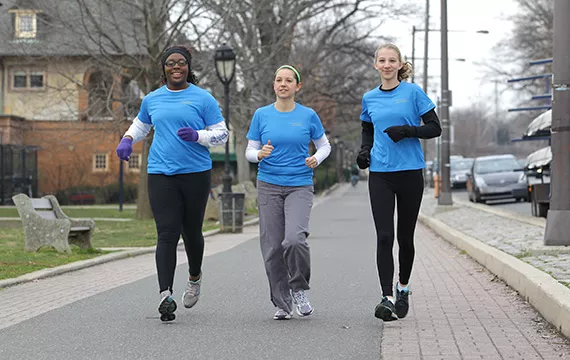 Osazenoriuwa Ebose '15 joined development manager Amber Adamson '01 and Jenna Cody '16