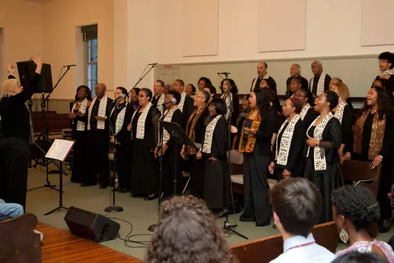 The full choir peforming