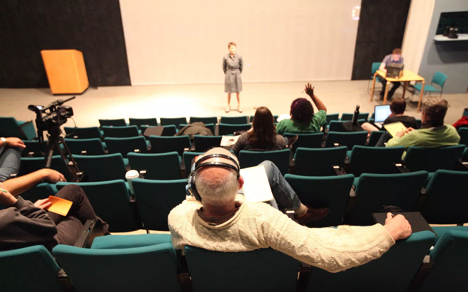 Lang Performing Arts Center staff watch performers practice
