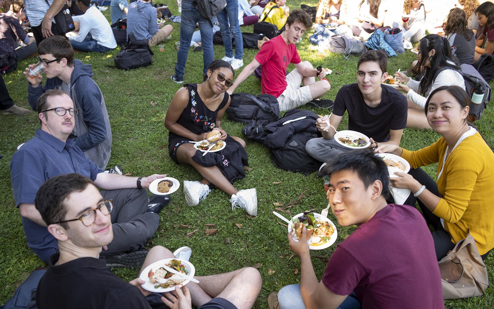 students gathered on grass