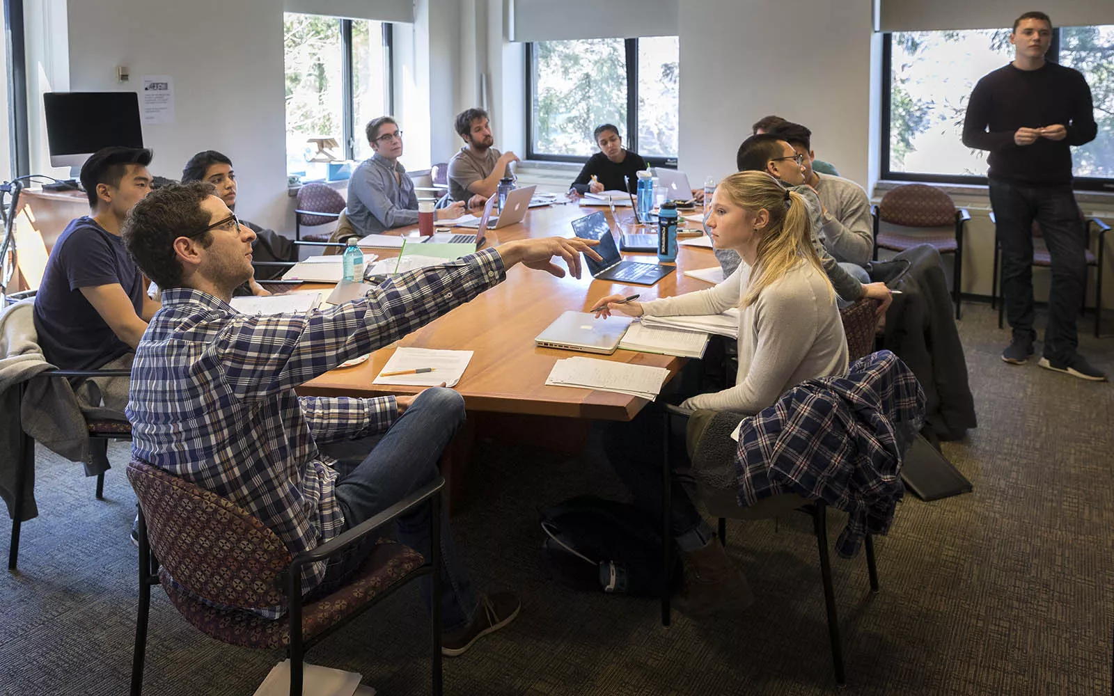 students talking in class