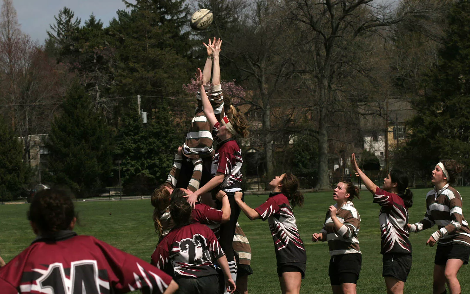 female students in a rugby match