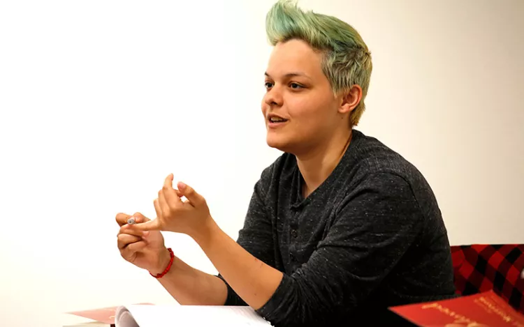 Student speaks during seminar