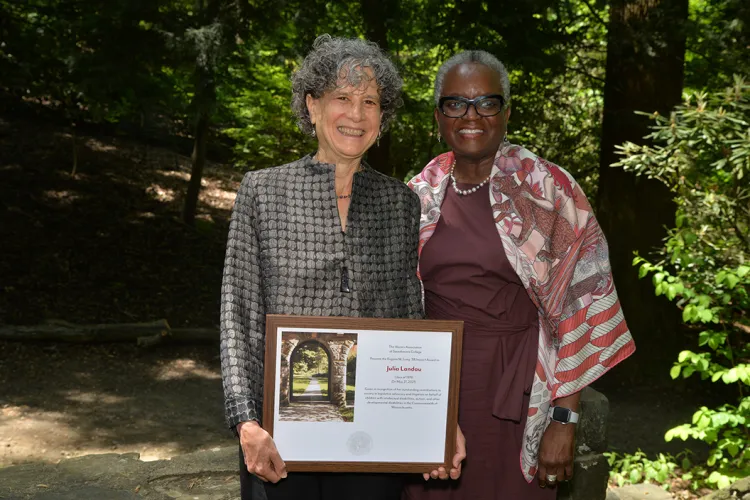 Julia Landau ’78 with President Smith