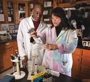 Amy Cheng working with colleague