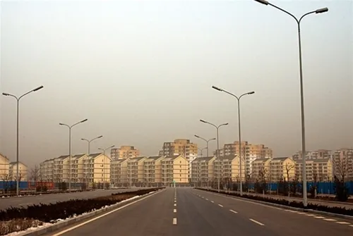 The empty city of Ordos in China, showing brand new buildings and road where no one lives