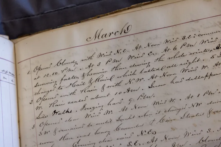 close up photograph of a notebook kept by Frank Ball