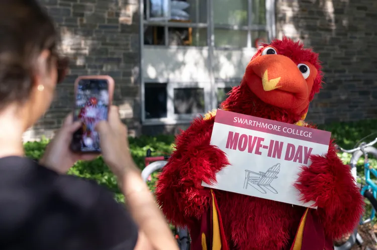 Phineas the phoenix poses for picture during move-in day activities