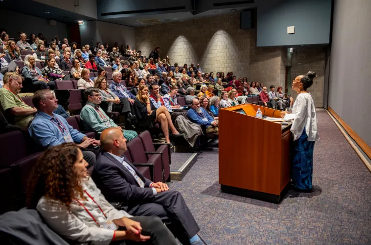 Speaker addresses crowd at peace conference