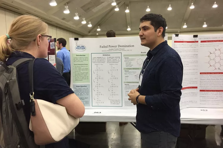 Jonathan Tostado-Marquez '19 with poster