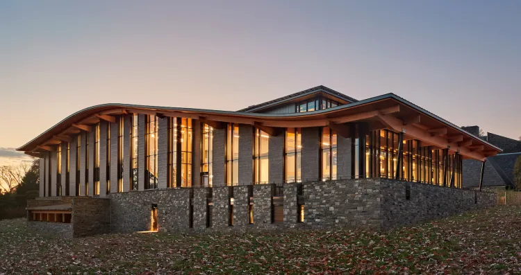 Exterior shot of Dining Center and Community Commons at night