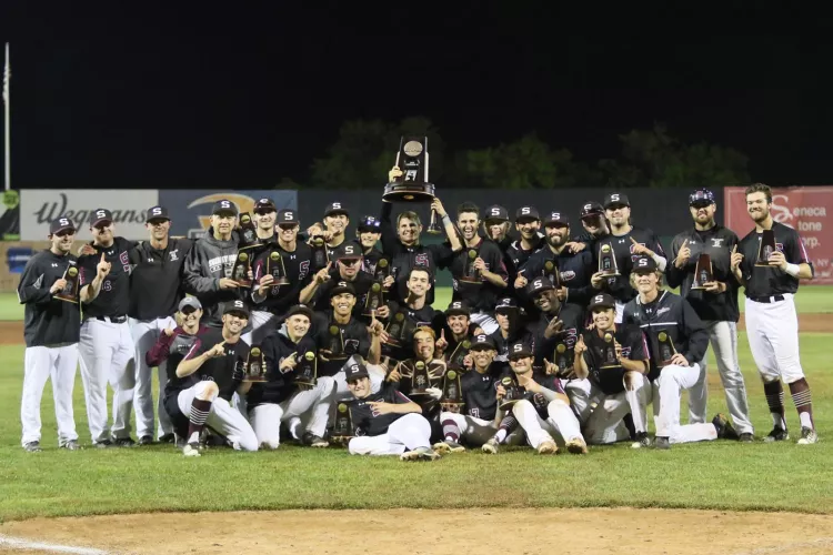The Garnet Baseball team with trophy