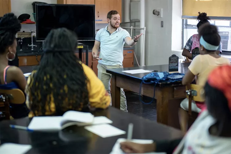 Amit Schwalb ’17 facilitates thinking about cancer biology in the Science for Kids (SFK) Workshop
