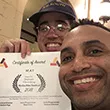 Student celebrates film prize certificate
