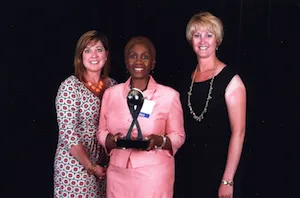 Swarthmore staff members accept the AARP Award