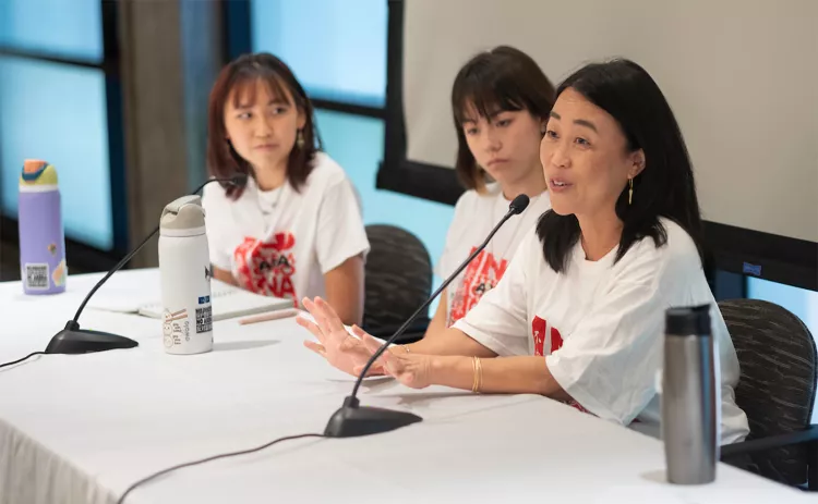 students activists speaking on campus