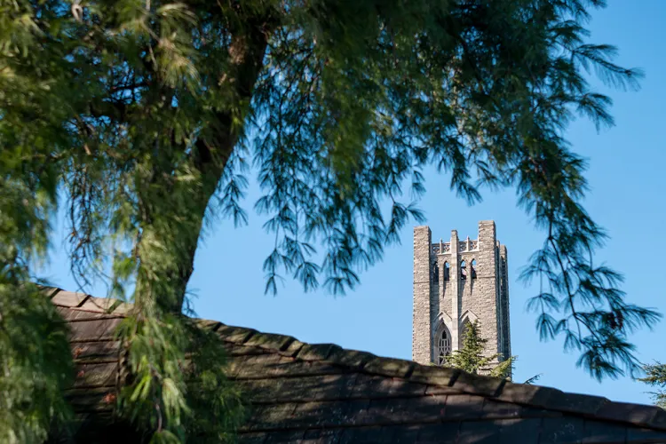 Clothier tower in background behind roof of sharples in foreground