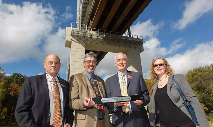 Vice President for Facilities and Capital Projects Stu Hain, Swarthmore Borough Mayor Tim Kearney, Vice President for Finance and Administration Greg Brown, and Special Assistant to the President Susan Eager