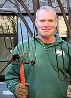 Dwight Darkow with pitchfork