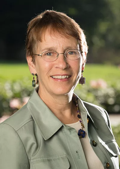 Portrait of Connie Hungerford in green shirt